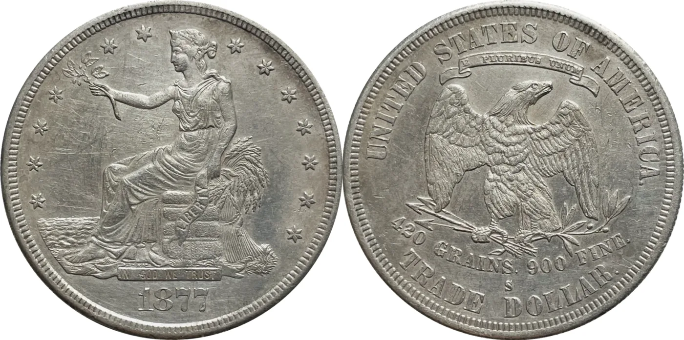 Obverse and reverse of an 1877-S Trade Dollar, the single letter S sitting between 900 FINE and the word DOLLAR