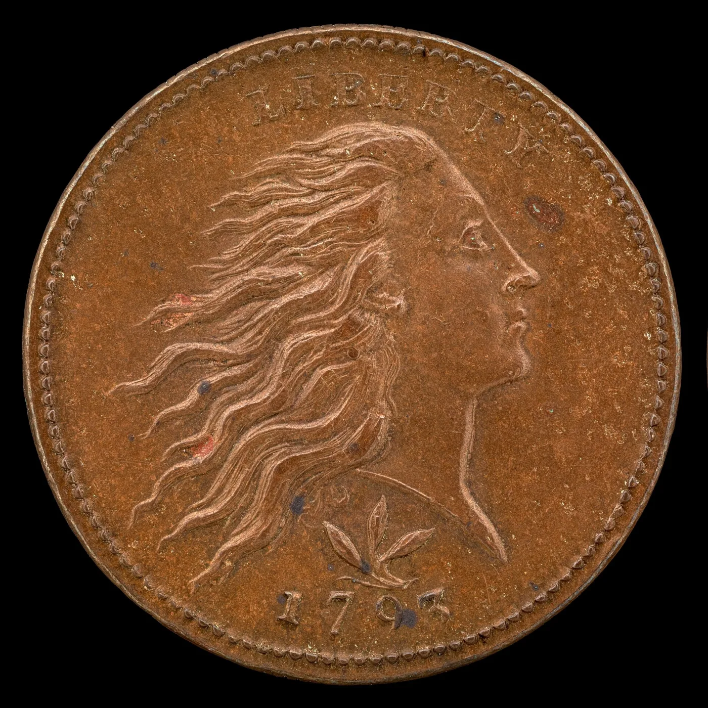 Obverse of a sharply detailed 1793 Wreath cent, a sprig of three leaves on a stem standing directly above the date 1793